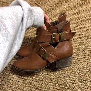 Brown booties with gold buckle